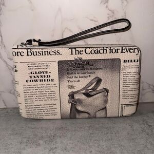Coach newspaper print wristlet